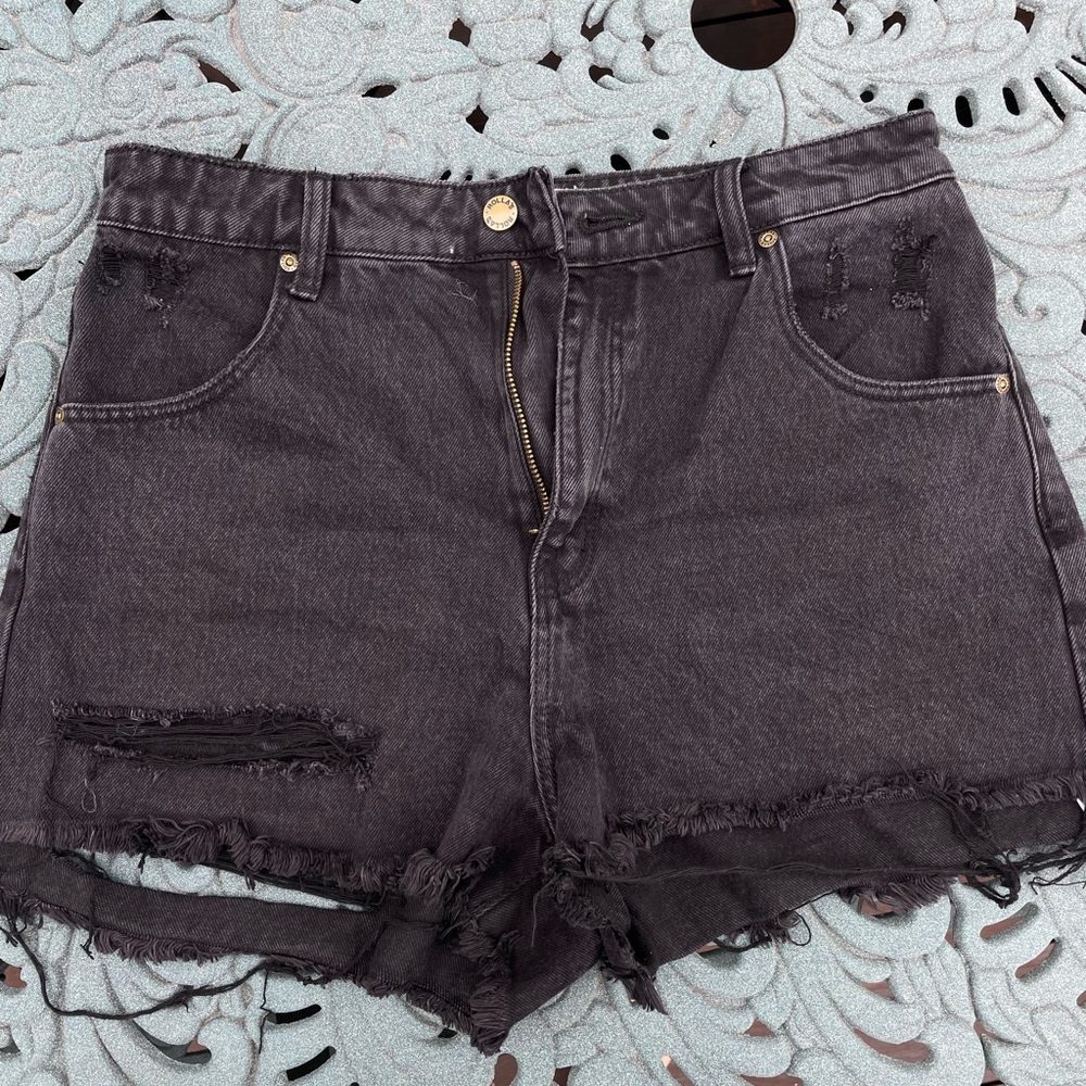 Rolla’s Dusters high rise black distressed denim shorts
